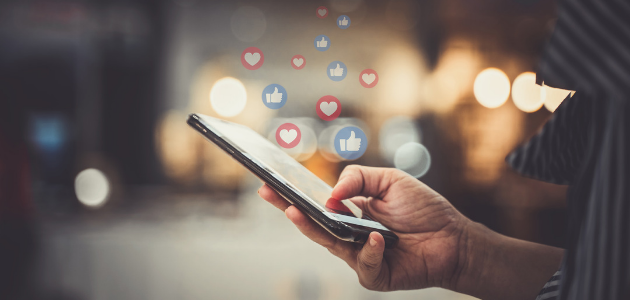 someone holding a phone with floating social media icons! floating social media icons